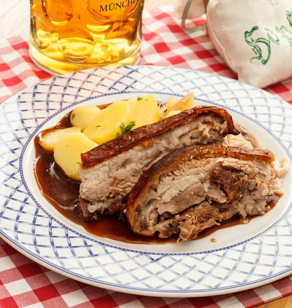 Pork with potatoes and beer — Stock Photo, Image