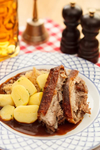 Pork with potatoes and beer — Stock Photo, Image