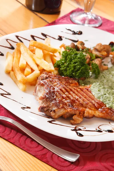 Grilled steak with french fries — Stock Photo, Image