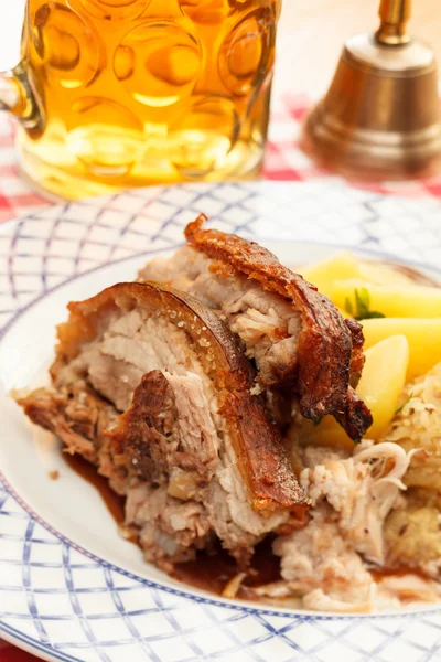 Pork with potatoes and beer — Stock Photo, Image