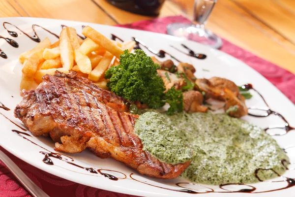 Grilled steak with french fries — Stock Photo, Image