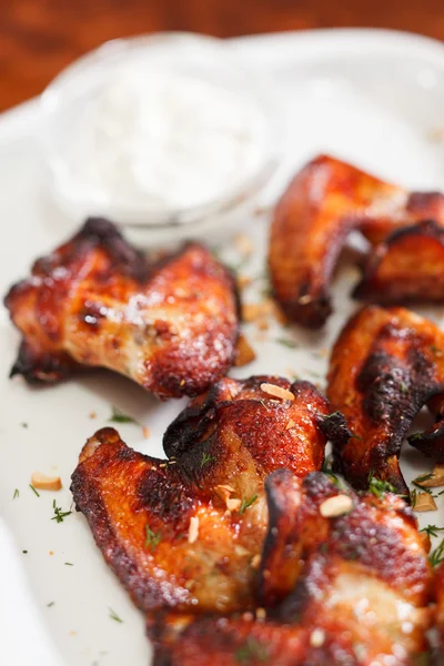 Chicken wings with sauce — Stock Photo, Image