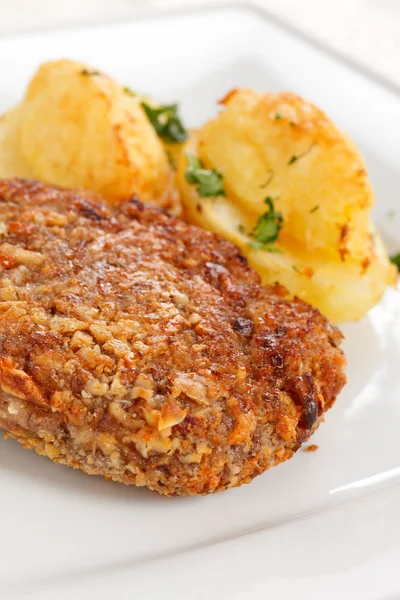 Schnitzel with potatoes — Stock Photo, Image