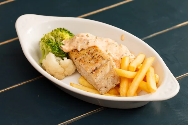 Chicken breast with french fries — Stock Photo, Image