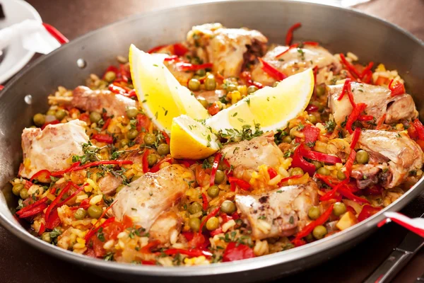 Paella with rabbit in a pan — Stock Photo, Image