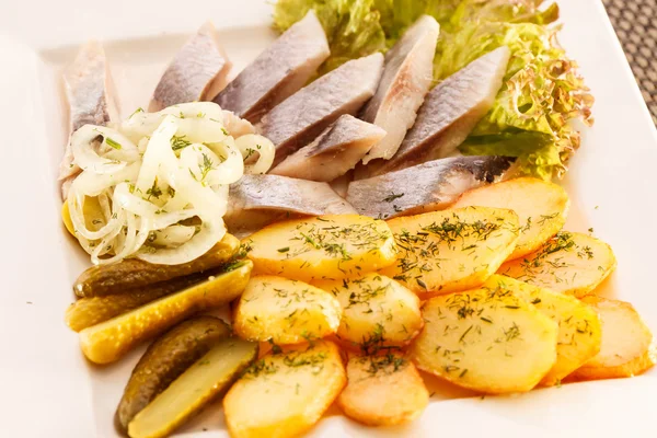 Herring slice with boiled potato — Stock Photo, Image