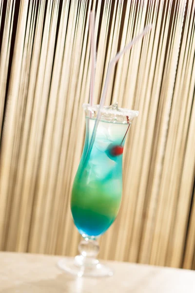 Blue cocktail with cherry — Stock Photo, Image