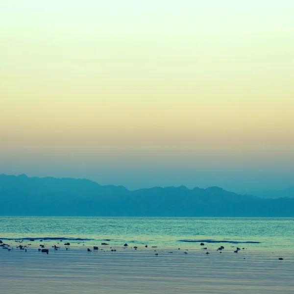 Pôr do sol sobre o mar — Fotografia de Stock