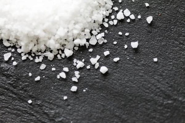 Salt on black — Stock Photo, Image