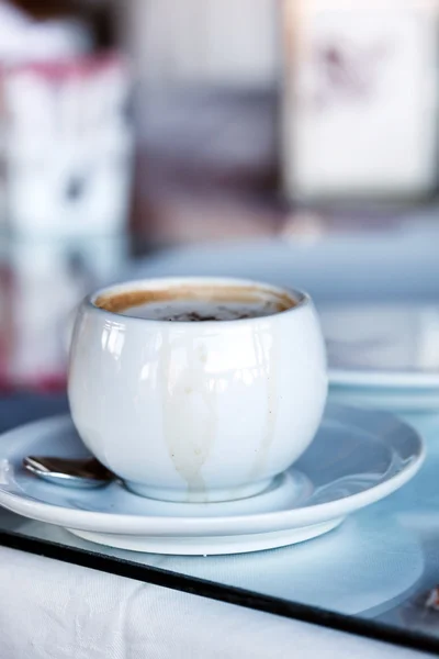 Cup of cappuccino in cafe — Stock Photo, Image