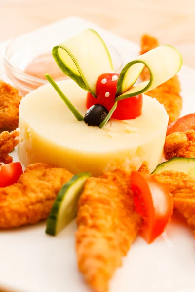 Chicken with mashed potatoes for kids menu — Stock Photo, Image