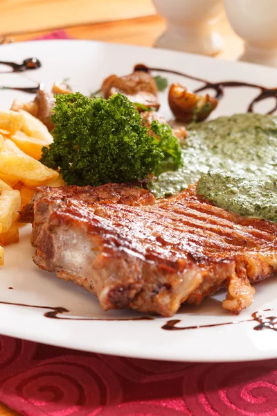 Grilled steak with french fries — Stock Photo, Image