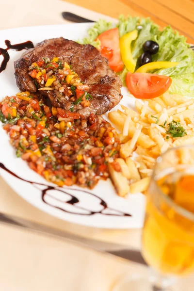 Grilled steak with french fries — Stock Photo, Image