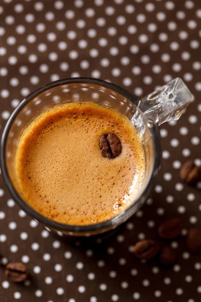 Koffiekopje en bonen — Stockfoto