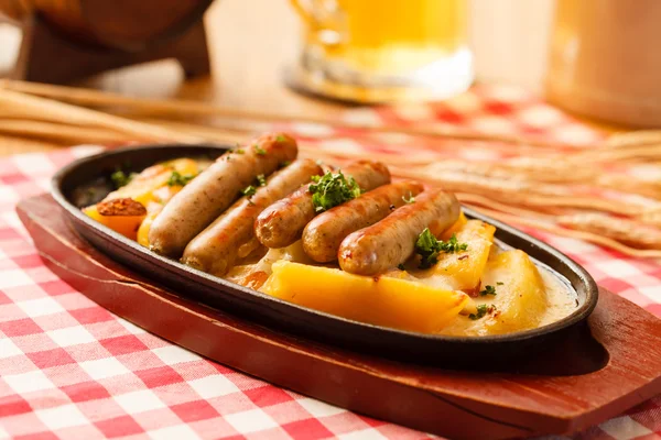 Roasted potatoes with sausage — Stock Photo, Image