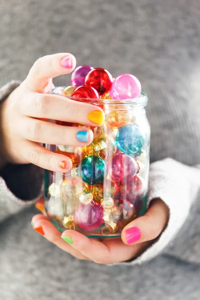 stock image Christmas balls in the hands