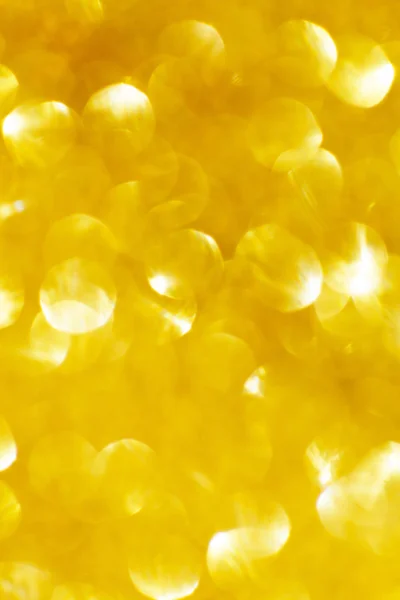 Férias abstratas luzes douradas no fundo — Fotografia de Stock