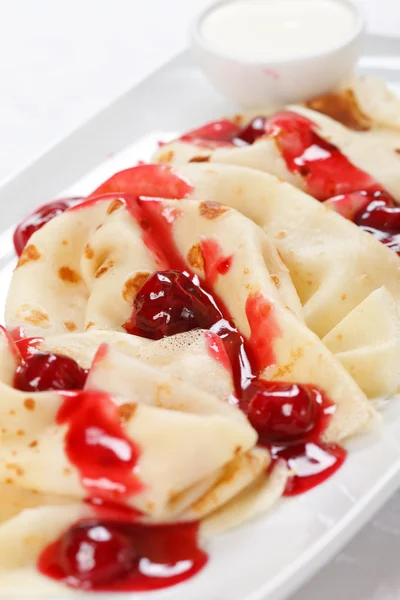 Pancakes with cherry — Stock Photo, Image