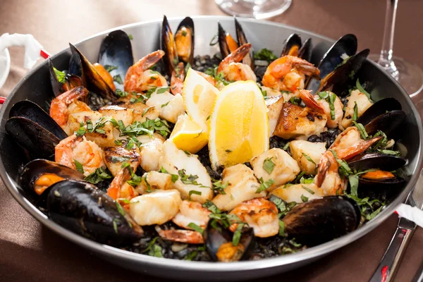 Seafood paella in the fry pan — Stock Photo, Image