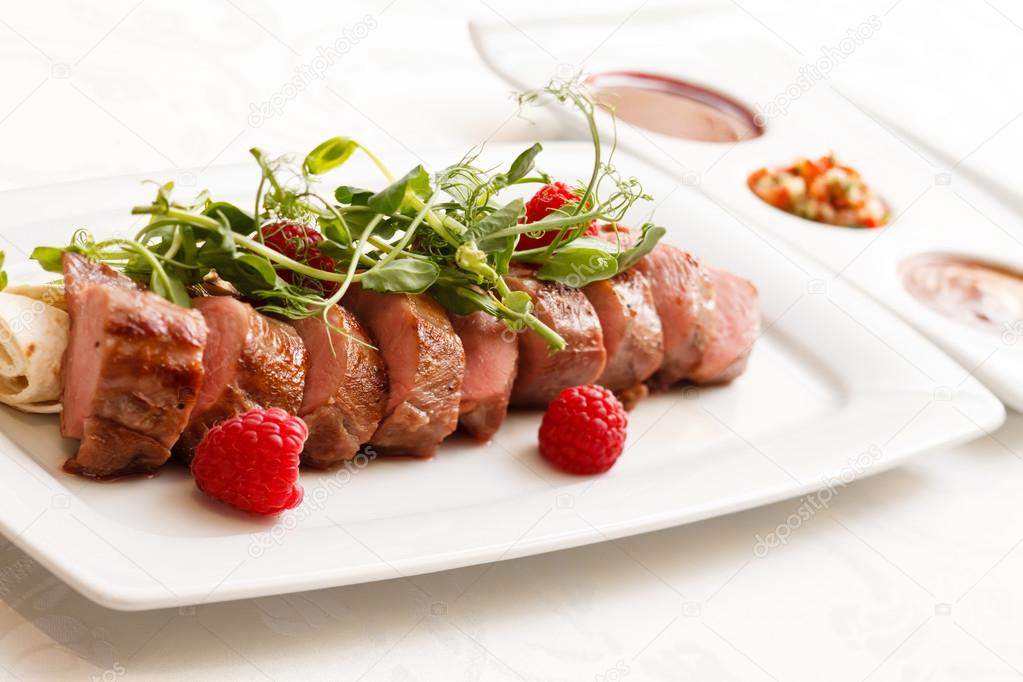 Grilled duck breast with sauce