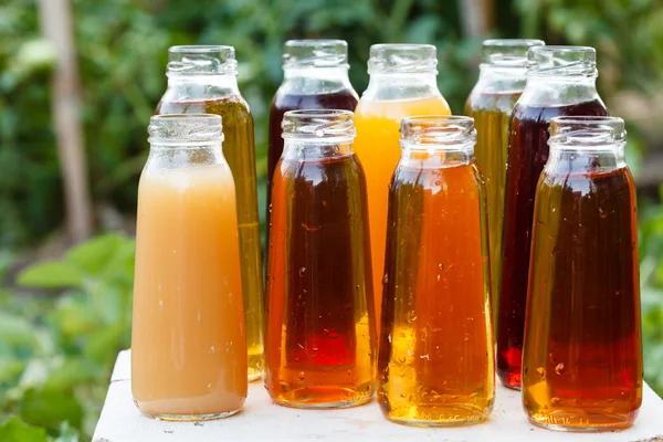 Different bottles of juice — Stock Photo, Image