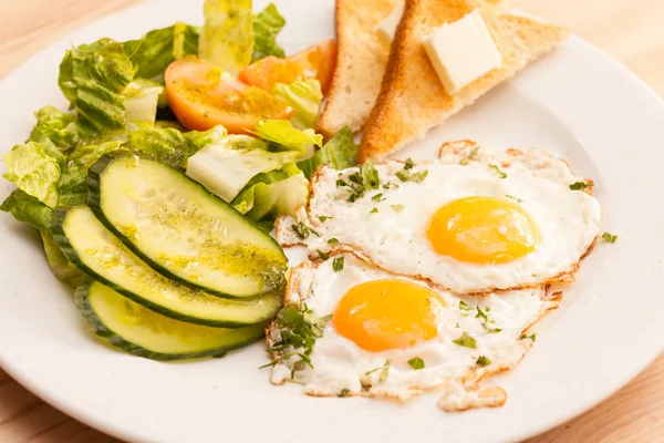 Breakfast with eggs ant toasts — Stock Photo, Image