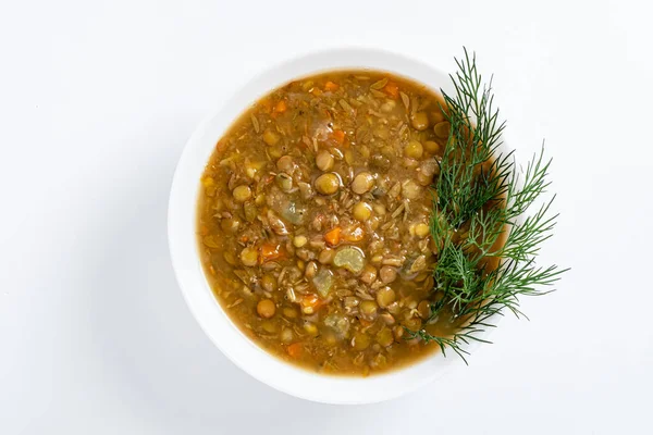 green lentil soup on the white background