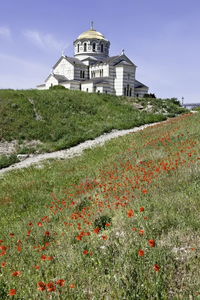 Church and poppies — Stock Photo, Image