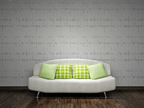 Biała kanapa w pobliżu ściany — Zdjęcie stockowe