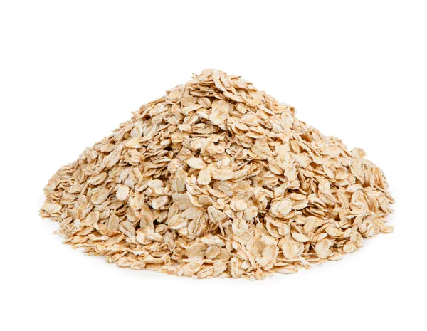 Copos de avena aislados sobre fondo blanco. Alimentación saludable — Foto de Stock