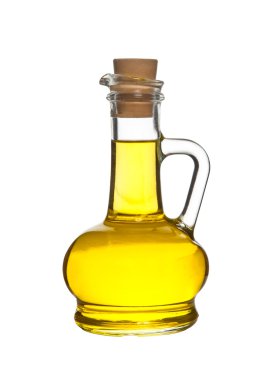 Beyaz arka plan üzerinde izole masanın üzerine zeytinyağı şişesi
