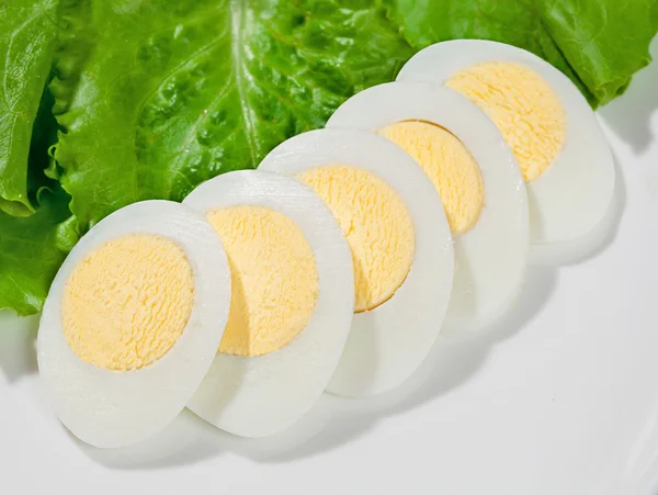 Chopped eggs on a salad — Stock Photo, Image