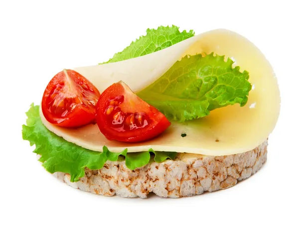 Concept diet - cheese lettuce and tomato on a rice wafer — Stock Photo, Image
