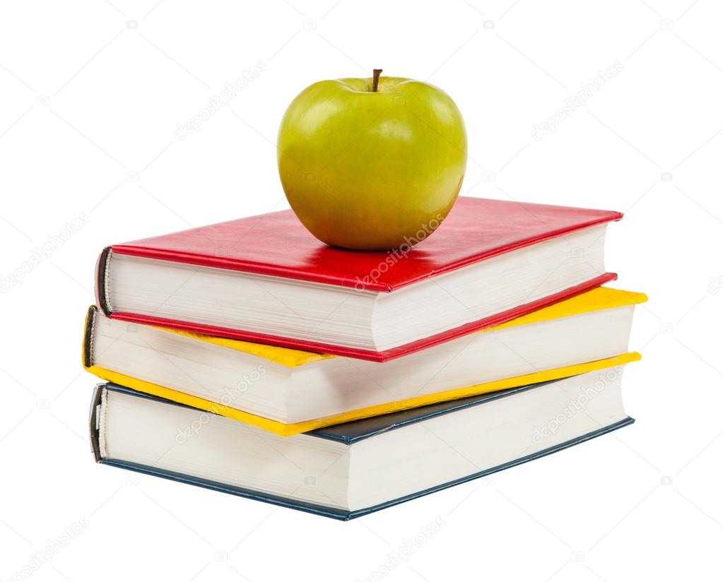 Back to school. Books and apple isolated on white background