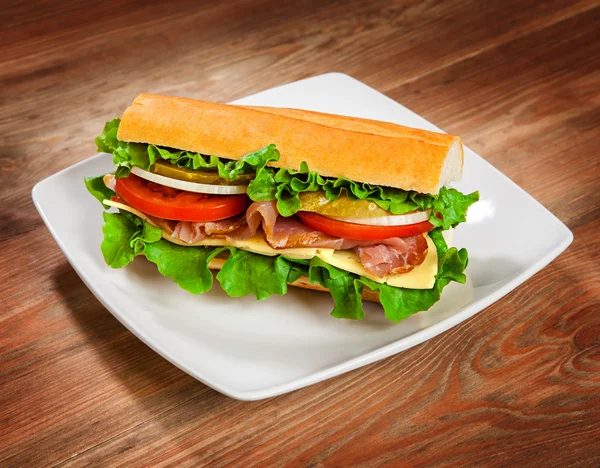 Tasty sandwich on the table — Stock Photo, Image