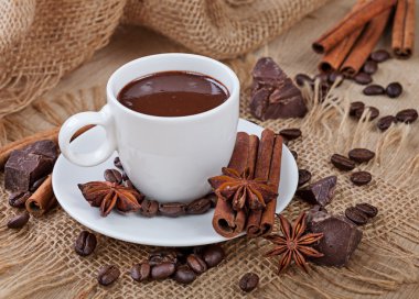 Hot chocolate, chocolate chips, cinnamon and star anise clipart