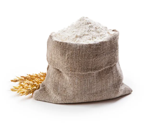 Flour in bag with wheat ears — Stock Photo, Image