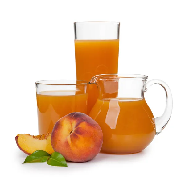Peaches and peach juice in a glass — Stock Photo, Image