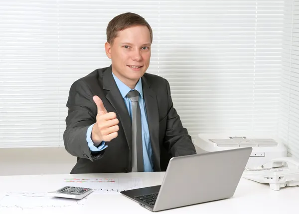 Business man with thumbs up gesture Stock Photo