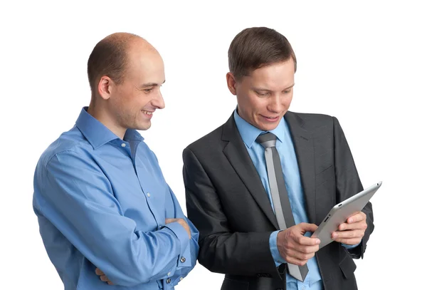 Geschäftsleute treffen sich und schauen auf Tablet-Computer — Stockfoto