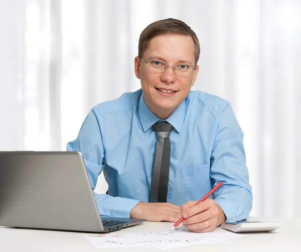 Young business man smiling — Stok fotoğraf