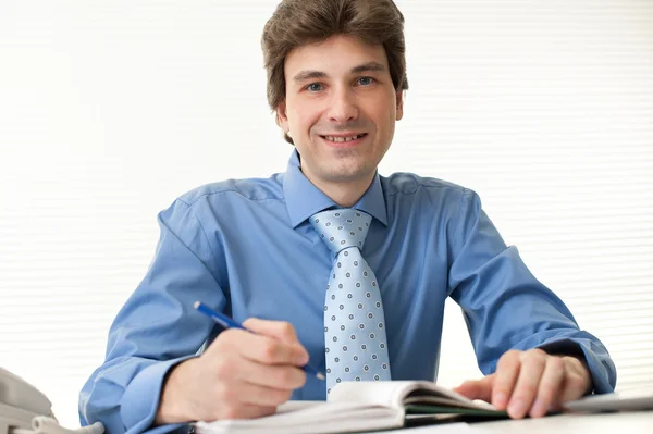 Businessman working with documents In the office. Royalty Free Stock Images