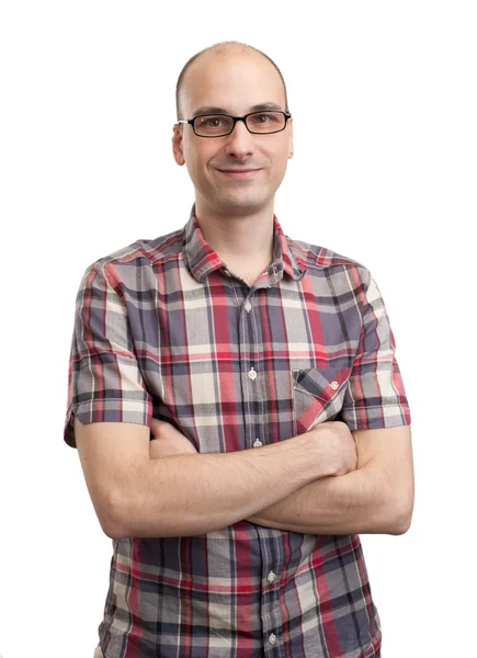 Casual young man looking at camera with arms crossed Stock Image