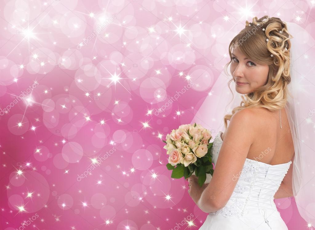 Beautiful bride. Pink bokeh background