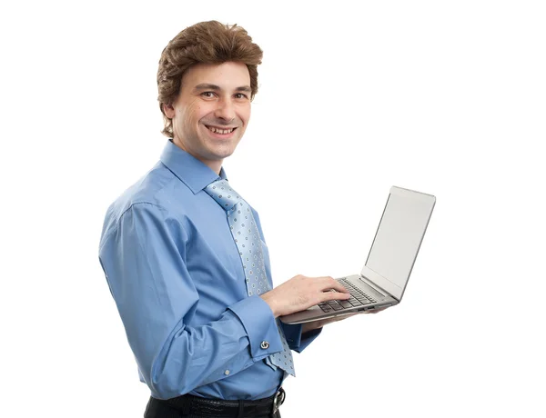 Hombre de negocios con un portátil aislado sobre blanco — Foto de Stock