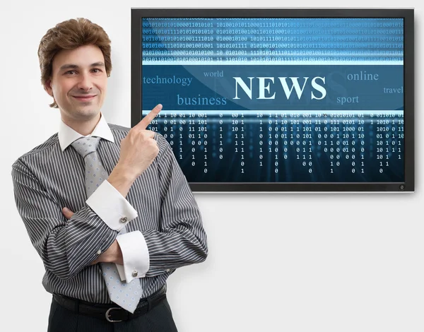 Hombre de negocios señalando con el dedo en la pantalla digital de noticias — Foto de Stock