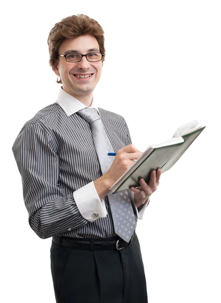 Homem de negócios sorrindo tomar notas — Fotografia de Stock