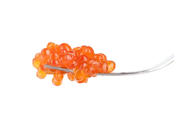 Caviar rouge sur une fourchette isolée sur blanc — Photo