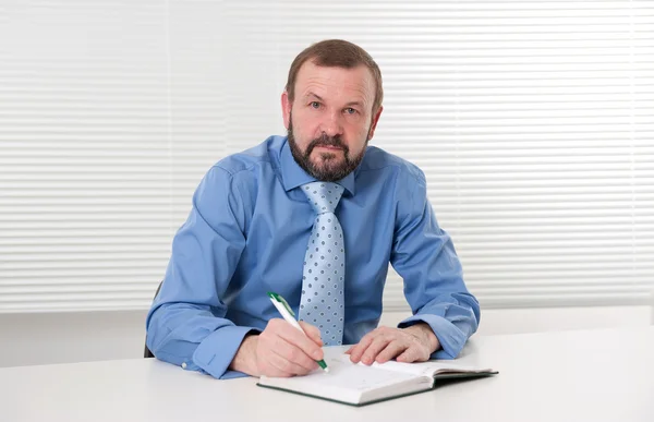 Business man making notes — Stock Photo, Image