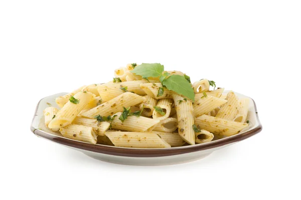 Pasta with pesto sauce on a plate — Stock Photo, Image